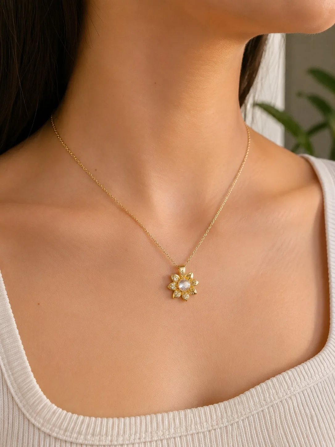 COLLAR GIRATORIO FLOR DE CRISTAL DORADO